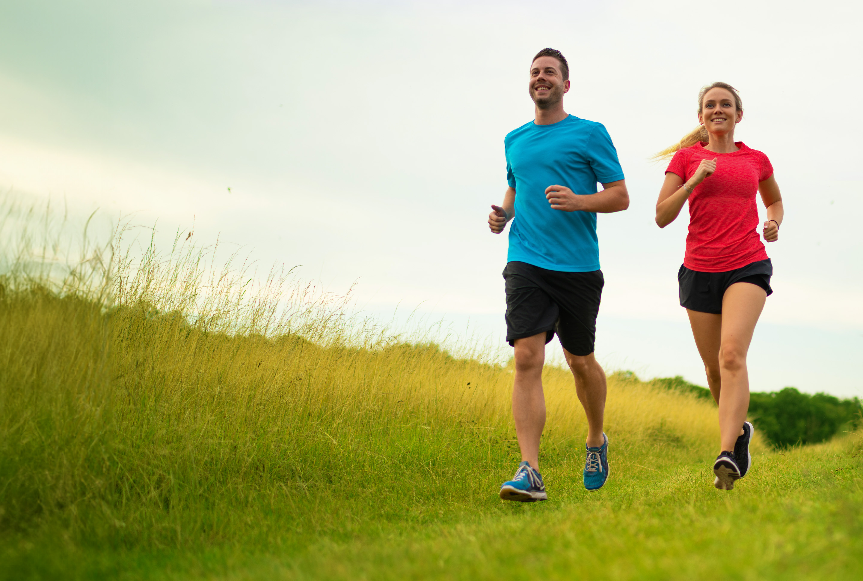 two people running together 