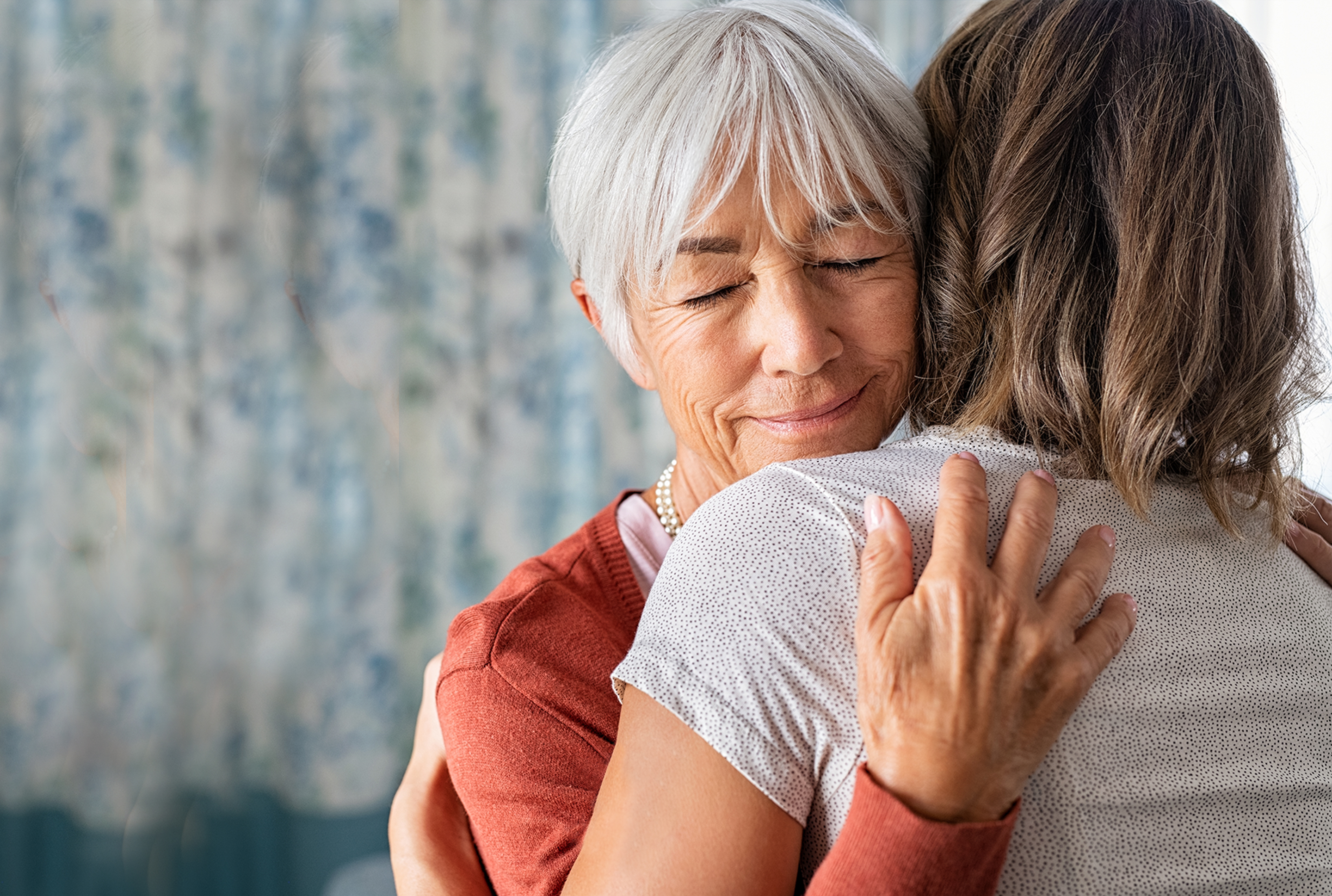 women hugging